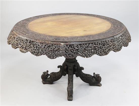 A large Anglo Indian carved padouk circular centre table, W.4ft 4in.